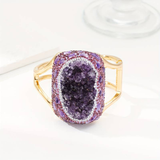 Bague vintage en or brillant violet