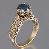 Bague vintage creuse en cristal bleu doré