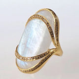 Bague vintage en or avec opale blanche