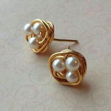 Boucles d'oreilles vintage en forme de nid de perles