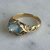 Bague vintage en or avec pierre bleue