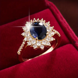 Bague avec zircone bleue foncée brillante