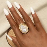 Bague vintage en or avec pierre blanche