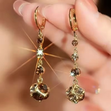 Boucles d'oreilles pendantes vintage brillantes