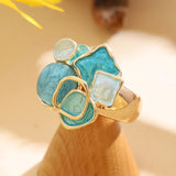 Bague en or avec émail bleu et blanc