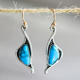 Boucles d'oreilles vintage en pierre polie bleue