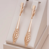 Élégantes boucles d’oreilles pendentif en or