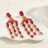 Boucles d'oreilles vintage en cristal rouge et rose et or