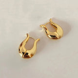 Boucles d'oreilles fluides et élégantes en or