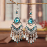 Boucles d'oreilles pendantes vintage en argent et cristal bleu aqua