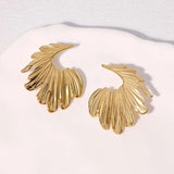 Boucles d'oreilles fantaisie en or en forme de feuilles incurvées