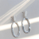 Boucles d'oreilles pendantes ovales vintage en argent