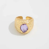 Bague ajustable en or avec pierre précieuse violet clair