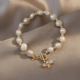 Bracelet à breloques papillon en or et cristal avec perles