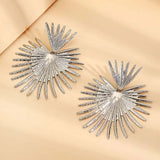 Boucles d'oreilles argentées à motif soleil rayonnant