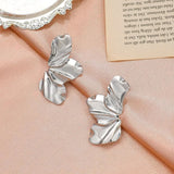 Boucles d'oreilles vintage en argent en forme de pétales