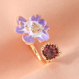 Bague ouverte vintage avec fleur violette et pierre précieuse lavande