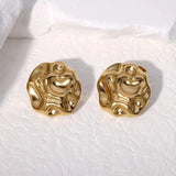 Boucles d'oreilles vintage abstraites au design fluide en or