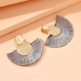 Boucles d'oreilles circulaires en or avec franges argentées