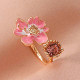 Bague ouverte vintage rose à motif floral et pierre précieuse rose