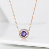 Collier vintage en or rose avec cristal violet étincelant