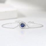 Bracelet vintage en argent avec cristaux bleus et bordure pavée