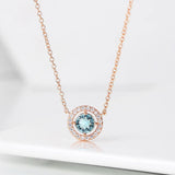 Collier pendentif en cristal bleu clair et or rose