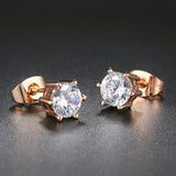 Boucles d'oreilles classiques en or rose avec cristaux brillants