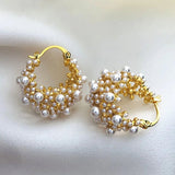 Boucles d'oreilles créoles vintage en or avec perles