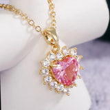 Collier vintage en or rose avec cœur et cristal