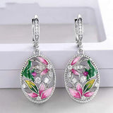 Boucles d'oreilles pendantes en argent avec fleurs en cristal