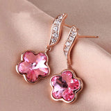 Boucles d'oreilles florales charmantes en cristal rose étincelant
