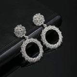 Grandes boucles d'oreilles pendantes rondes en argent vintage