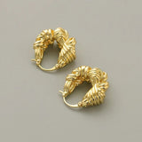 Boucles d'oreilles en or avec gros nœud