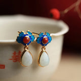 Boucles d'oreilles rétro en or et bleu avec motif floral rouge et blanc et pierres précieuses