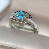 Bague vintage en argent avec gemme bleue et cristal brun
