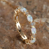 Bague éternité vintage en or et opale