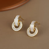 Boucles d'oreilles créoles en or et cristal blanc étincelant
