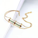 Bracelet rétro en or vert et marron avec pierres précieuses