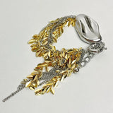 Bracelet vintage ajustable avec breloque feuille en or et argent
