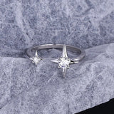 Bague ajustable classique en argent avec deux étoiles et pierre transparente