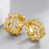 Boucles d'oreilles créoles en cristal avec motif floral doré