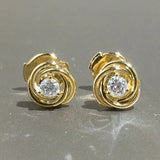 Boucles d'oreilles spirales dorées scintillantes