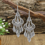 Boucles d'oreilles pendantes en argent antique