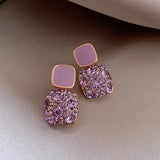 Boucles d'oreilles rétro violettes scintillantes