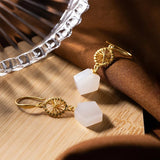 Boucles d'oreilles vintage en or géométriques avec perles blanches et motif soleil rayonnant