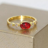 Bague vintage en or avec pierre ovale rouge vif