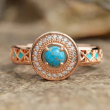 Bague vintage en or rose et turquoise