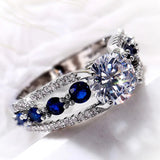 Bague vintage en argent et pierre précieuse ronde bleue