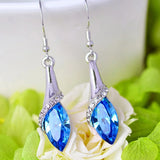 Boucles d'oreilles pendantes en cristal bleu argenté